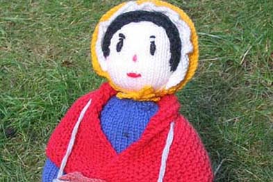 Knitted peddler doll